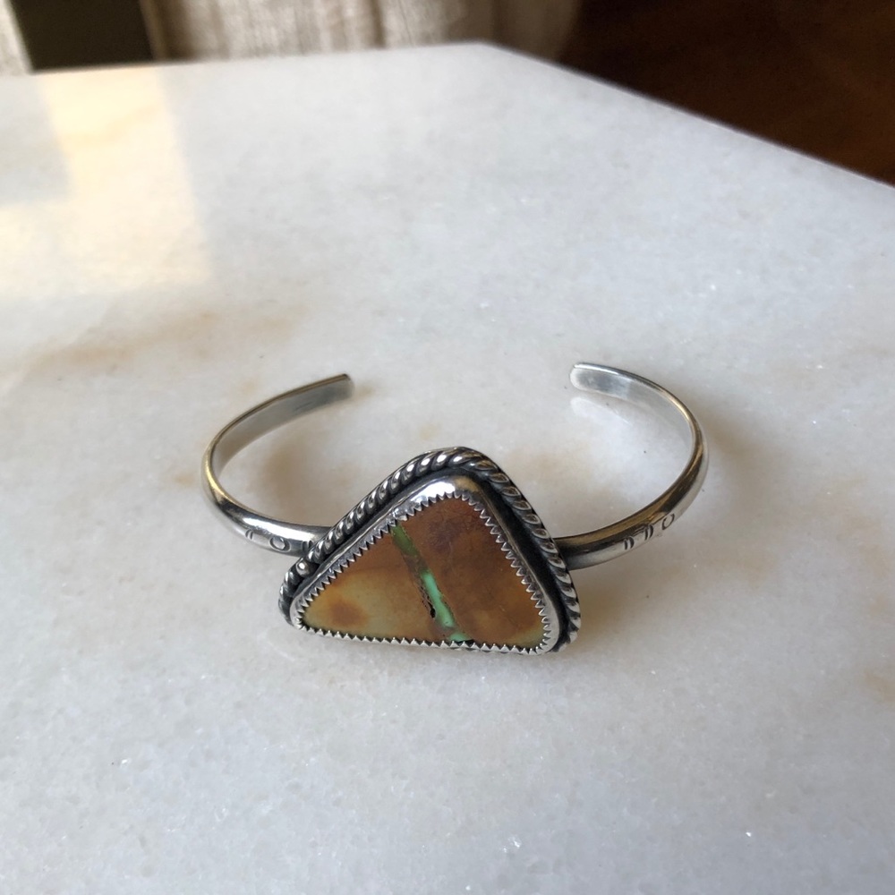 Brown turquoise cuff bracelet.